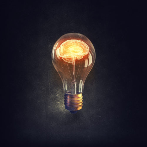 en bild på en hjärna med dopamin i en glödlampa